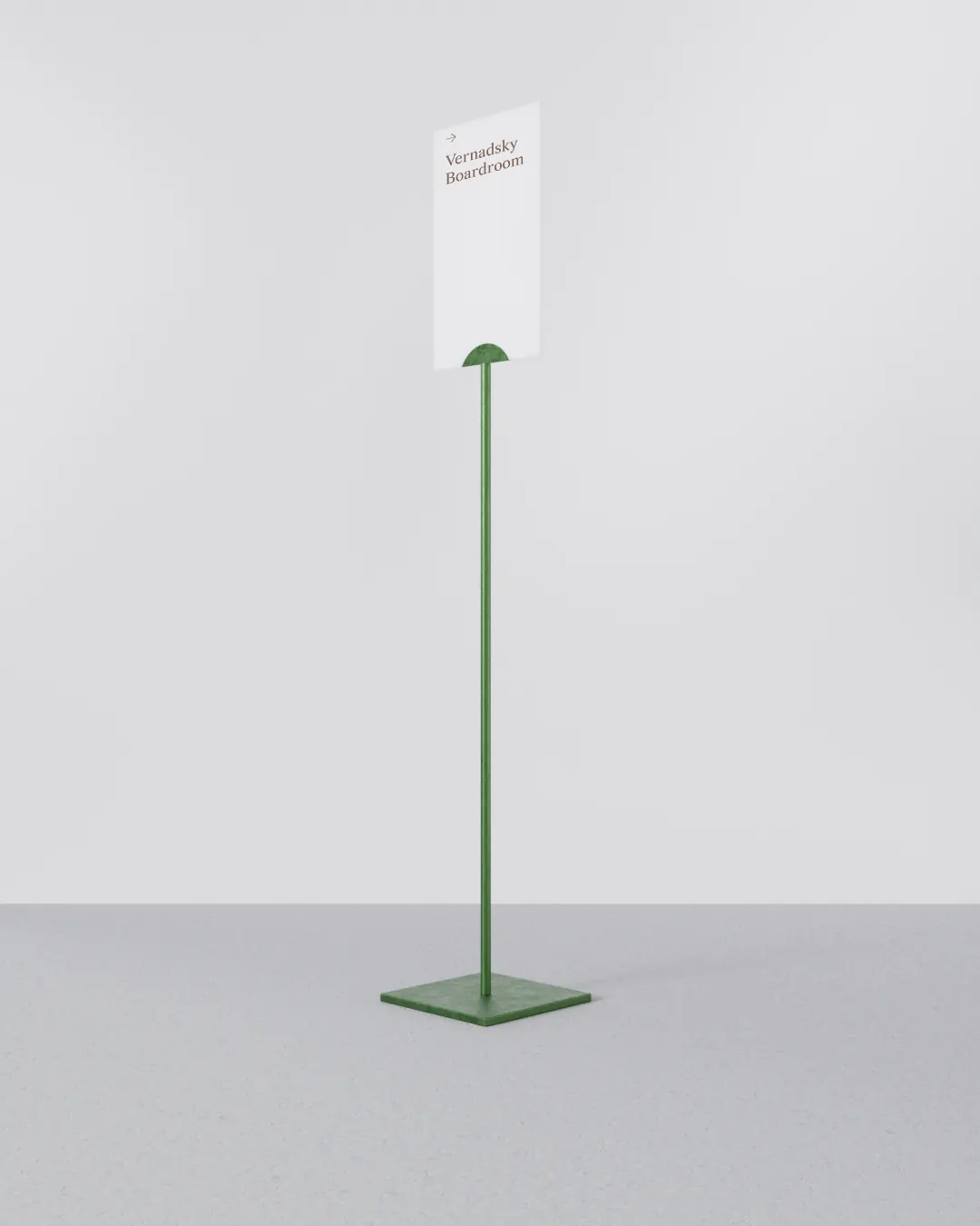 Free-standing sign on a thin green post